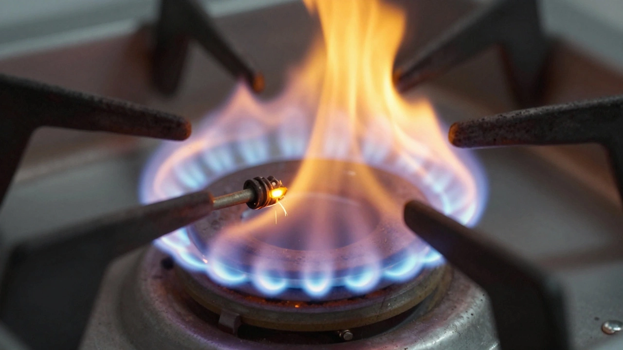 Close up of gas burner flame showing inefficient yellow tips instead of blue.